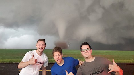 May 2022, around Memphis, Texas—Mark and Matt with Storm Chaser Chad  in front of one of the seven tornadoes they saw that day.