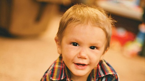 At 18 months, Austin was all smiles. photo by Schwartz Photography