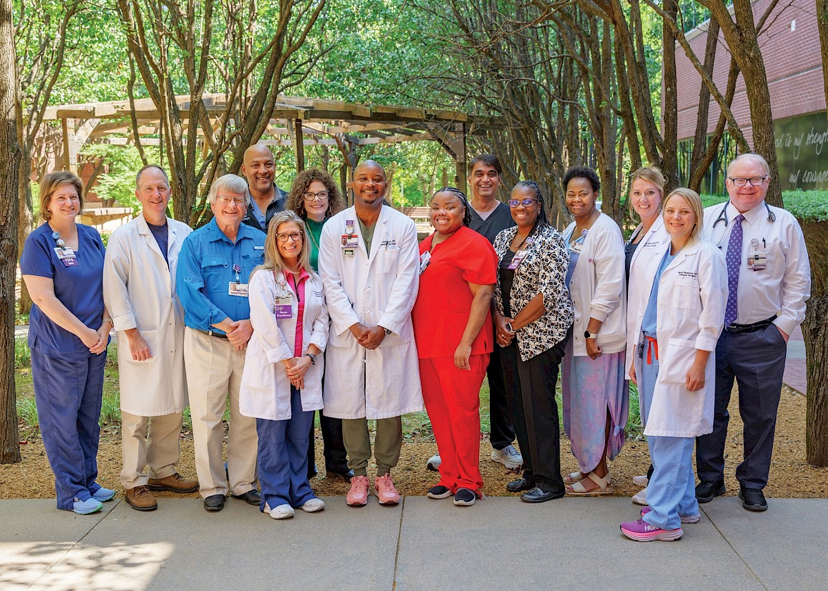 Members of the Tumor Board gather for bimonthly meetings at CHRISTUS St. Michael Hospital. (L-R) Jessica Smallwood, Dr. Malcolm Smith, Dr. Bryan Griffin, Dr. Reginald Baptiste, Yolanda Bone, Charlotte McKamie, Dr. Charles Matthews, Dr. Daphne Taylor, Dr. Sunil Patel,  Jowana Billingly, Lakecia Washington, Brandy Smith, Dr. Beth Peterson, and Dr. Gary Engstrom. photo by Matt Cornelius